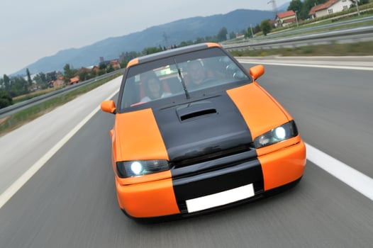 Tuning cars sacing down the highway photo