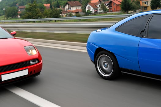 Tuning cars sacing down the highway photo