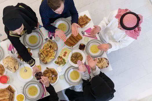 Top view of muslim family having Iftar during Ramadan holy month photo
