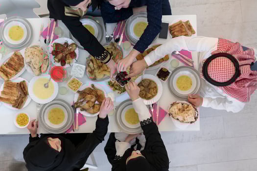 Top view of muslim family having Iftar during Ramadan holy month photo