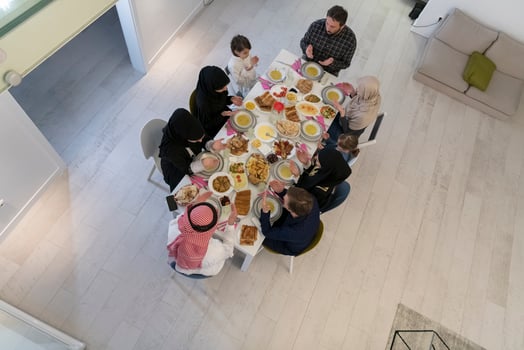 Top view of muslim family having Iftar during Ramadan holy month photo