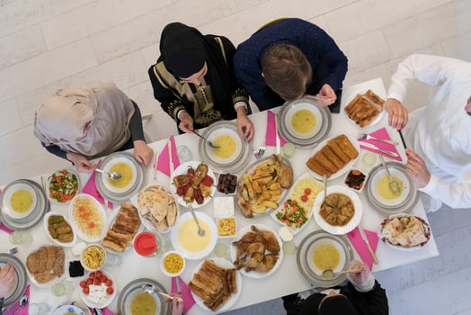 Top view of muslim family having Iftar during Ramadan holy month photo