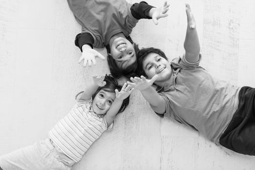 young boys having fun on the floor photo