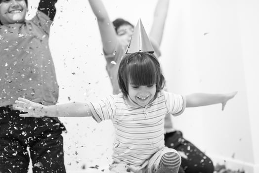 kids  blowing confetti photo