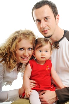 happy young family together in studio photo