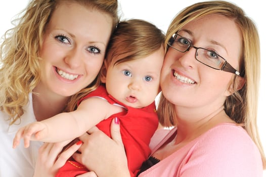happy young family together in studio photo