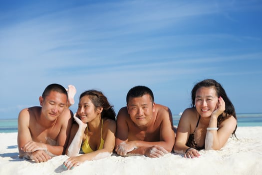 group of happy young people have fun on bach photo
