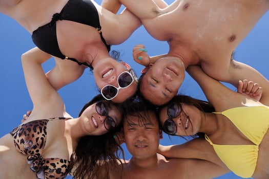 group of happy young people have fun on bach photo
