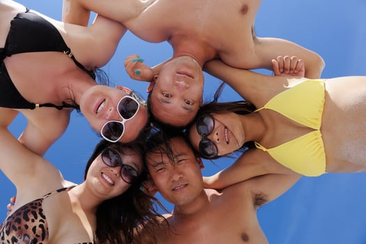 group of happy young people have fun on bach photo