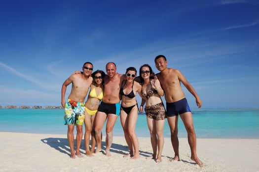 group of happy young people have fun on bach photo
