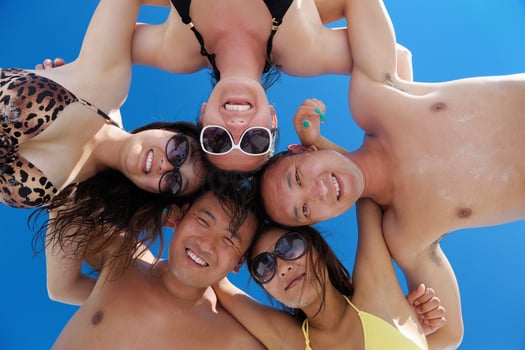 group of happy young people have fun on bach photo