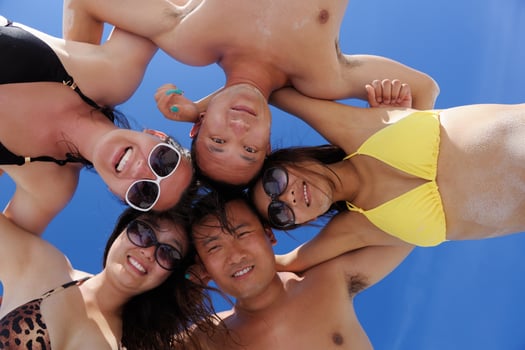 group of happy young people have fun on bach photo