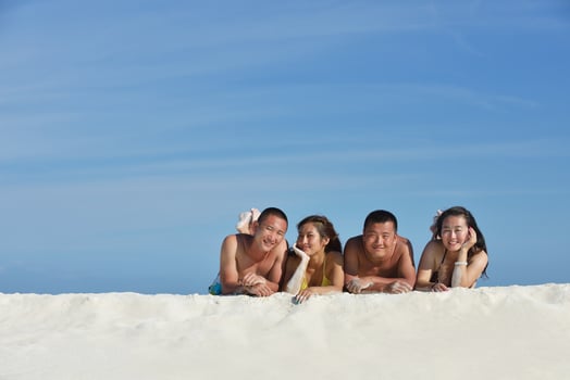 group of happy young people have fun on bach photo