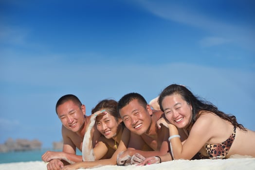 group of happy young people have fun on bach photo