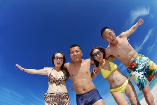 group of happy young people have fun on bach photo