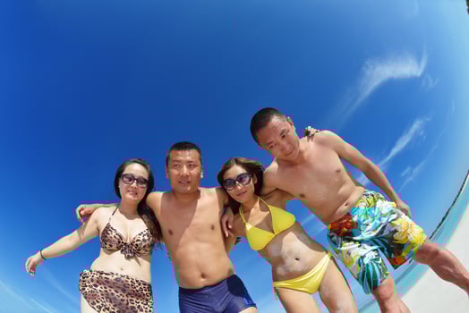 group of happy young people have fun on bach photo