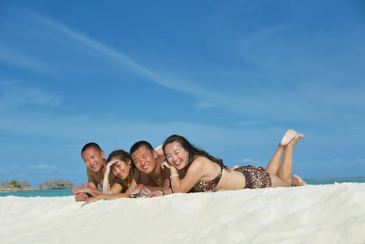 group of happy young people have fun on bach photo