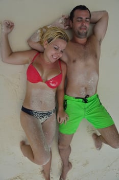 happy young  couple at summer vacation have fun and relax photo