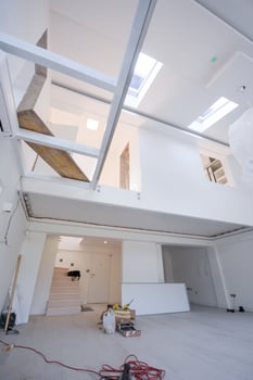 Interior of unfinished two level apartment photo