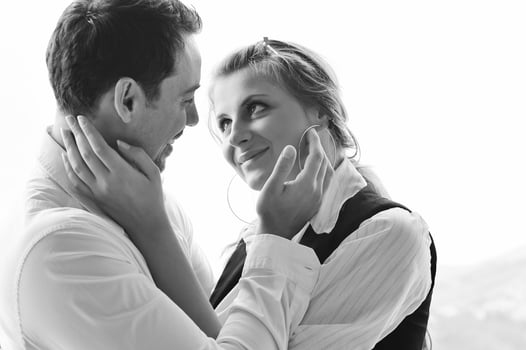 romantic happpy couple on balcony photo