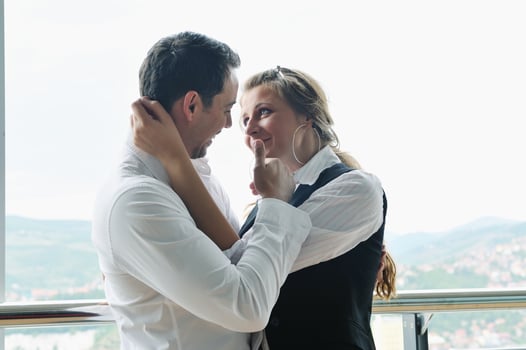 romantic happpy couple on balcony photo