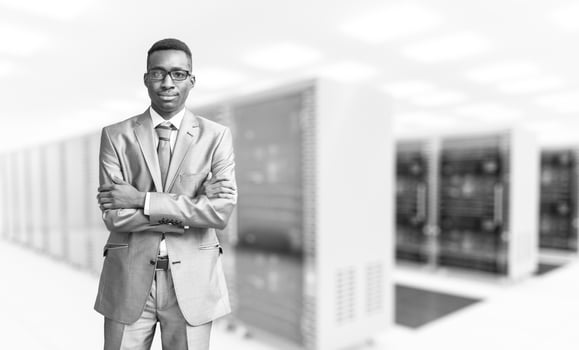 Young black man in server room photo
