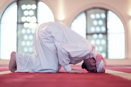 man performing sajdah in namaz photo