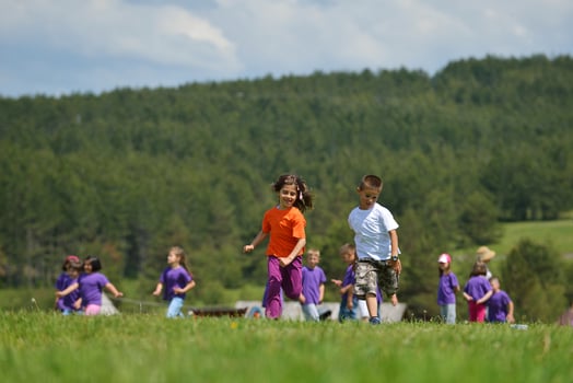 happy kids group  have fun in nature photo