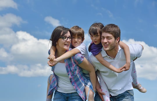 happy young family have fun outdoors photo