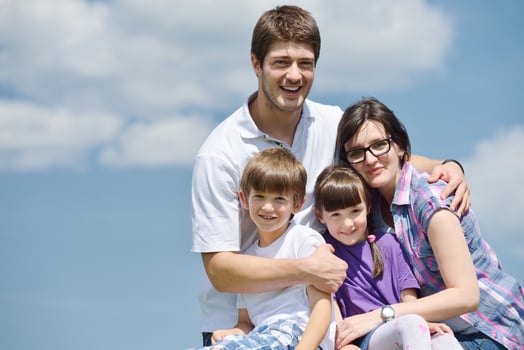 happy young family have fun outdoors photo
