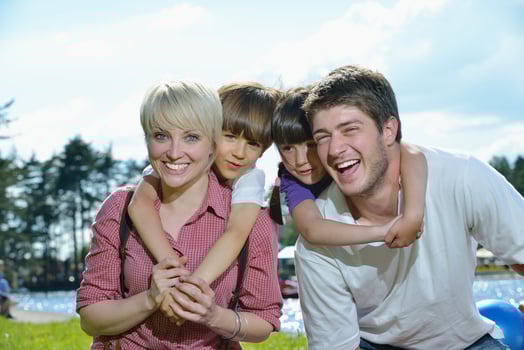 happy young family have fun outdoors photo