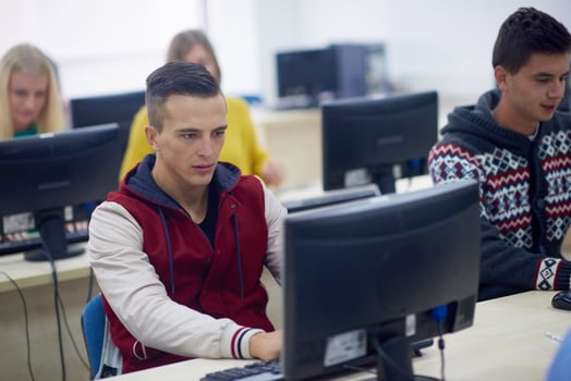 students group in computer lab classroom photo