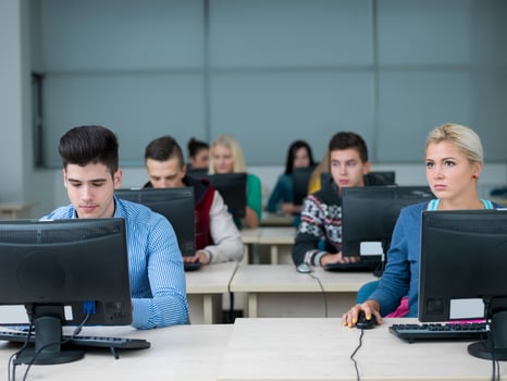 students group in computer lab classroom photo