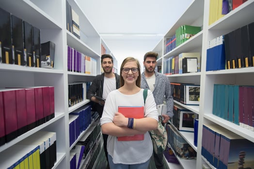 students group  in school  library photo