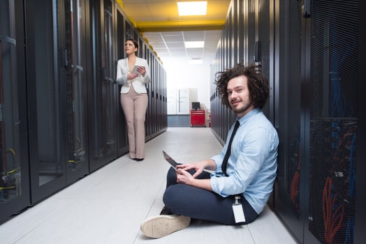 young technicians working together on servers photo