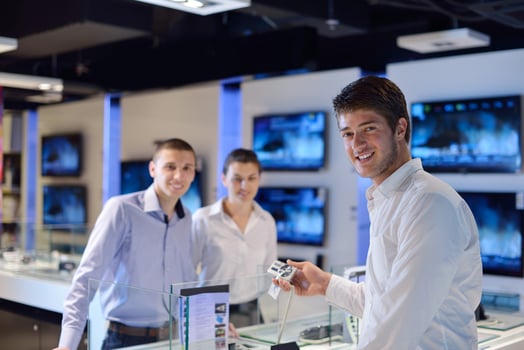 people buy  in consumer electronics store photo