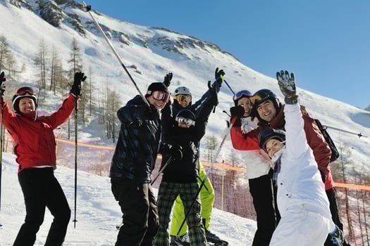winter portrait of friends at skiing photo