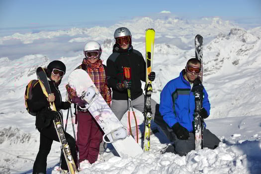 people group on snow at winter season photo