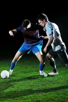 football players in competition for the ball photo