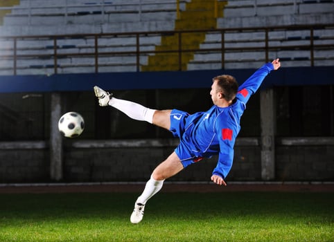 football player in action photo