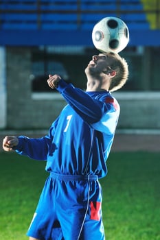 football player in action photo