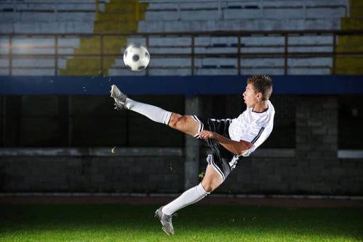 football player in action photo