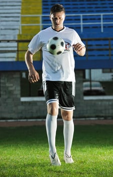 football player in action photo