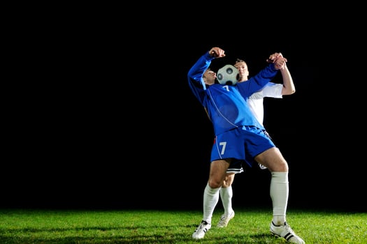 football players in action for the ball photo