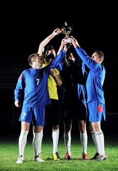 football players celebrating the victory photo