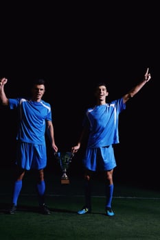 soccer players celebrating victory photo