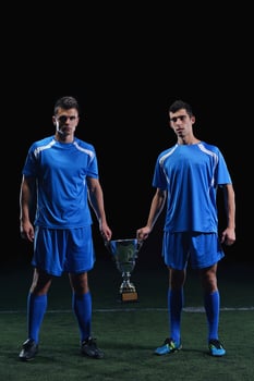 soccer players celebrating victory photo