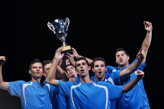 soccer players celebrating victory photo