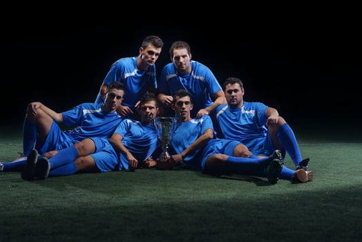 soccer players celebrating victory photo