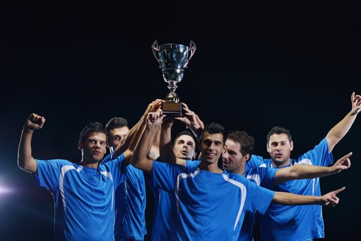 soccer players celebrating victory photo